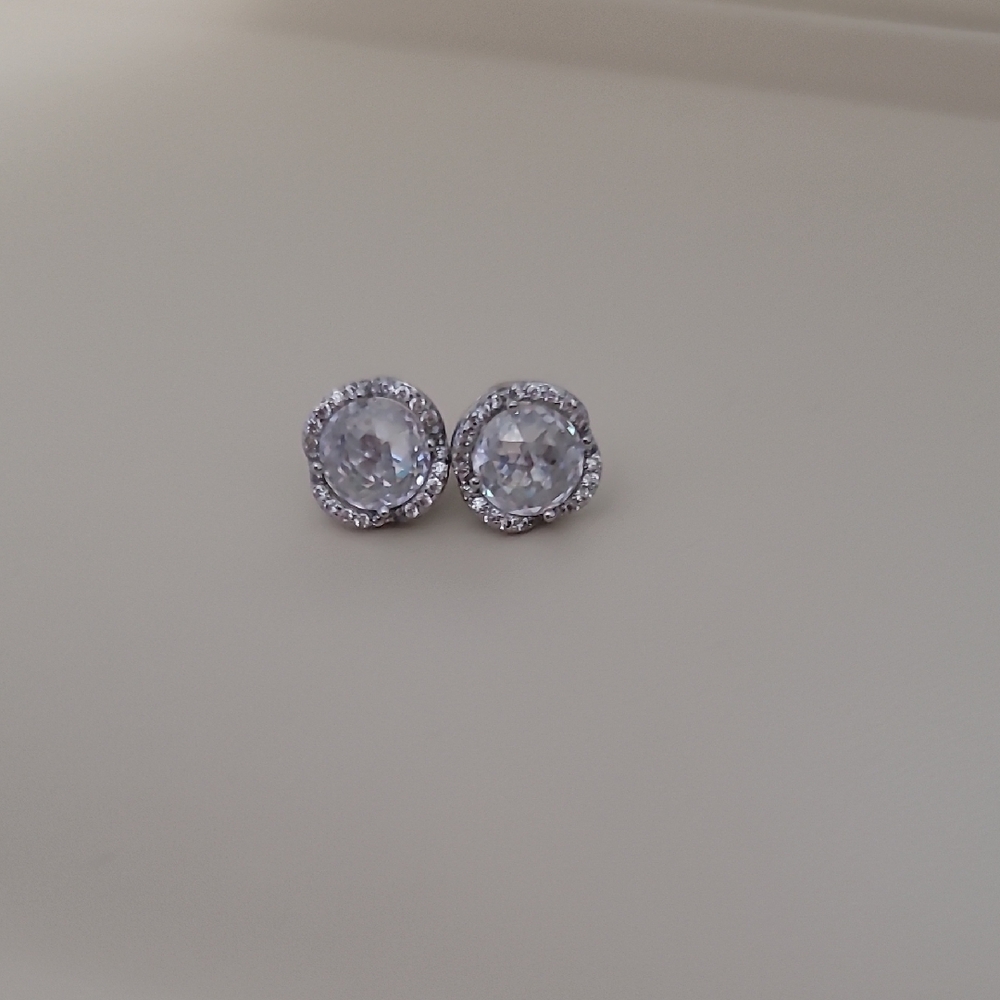 Kate Spade Elegant Silver Stud Earrings